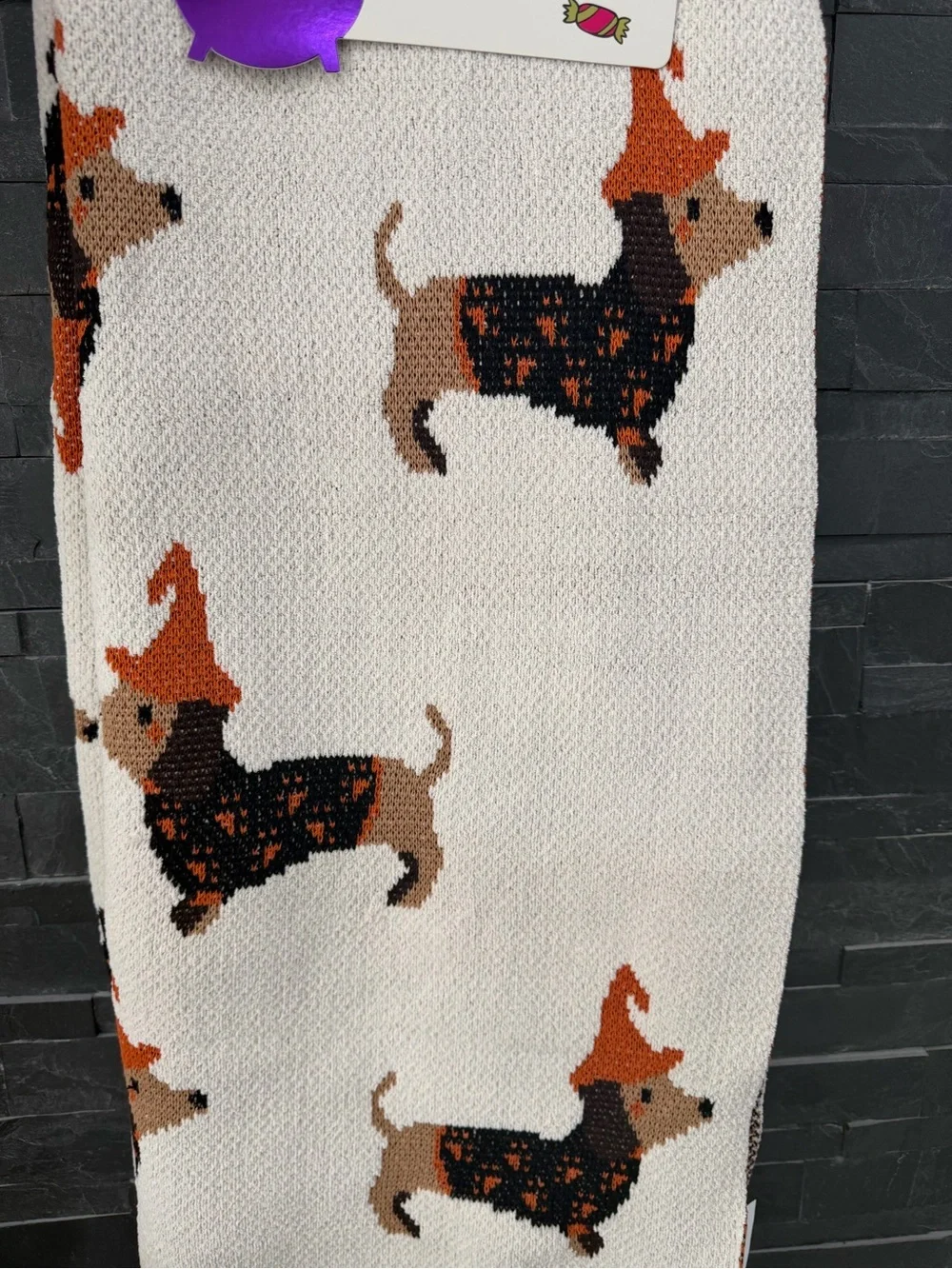 Isaac Mizrahi Cream Throw with Orange & Brown Dachshund Motif